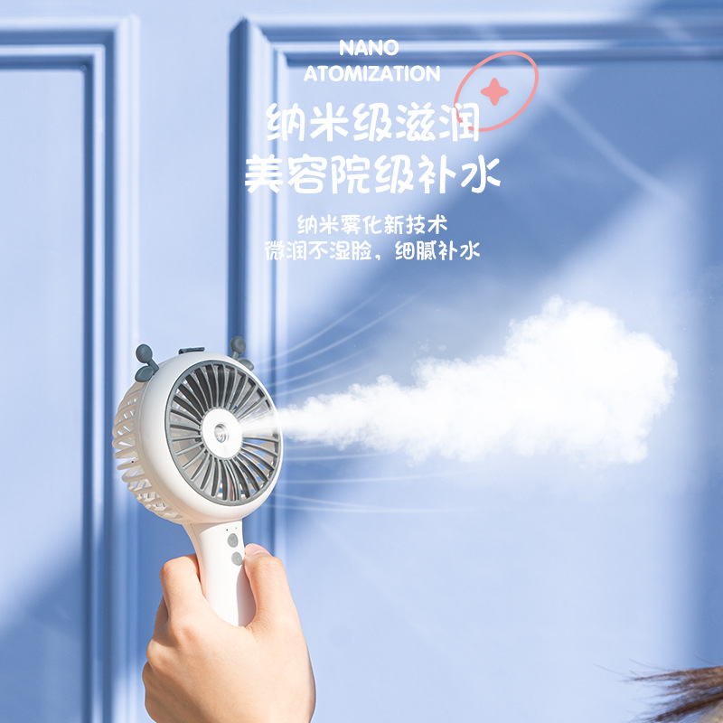 The 2025 new model mini portable USB rechargeable fan with water spray humidification function 6053