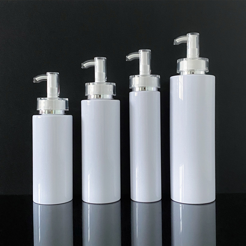 Transparent white flat - shouldered cosmetic lotion and toner dispensing bottles with press pumps Transparent white flat - shouldered cosmetic lotion and toner dispensing bottles with press pumps