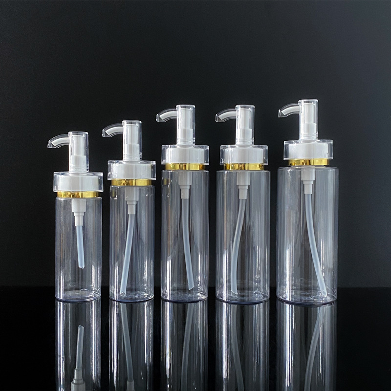 Transparent white flat - shouldered cosmetic lotion and toner dispensing bottles with press pumps Transparent white flat - shouldered cosmetic lotion and toner dispensing bottles with press pumps