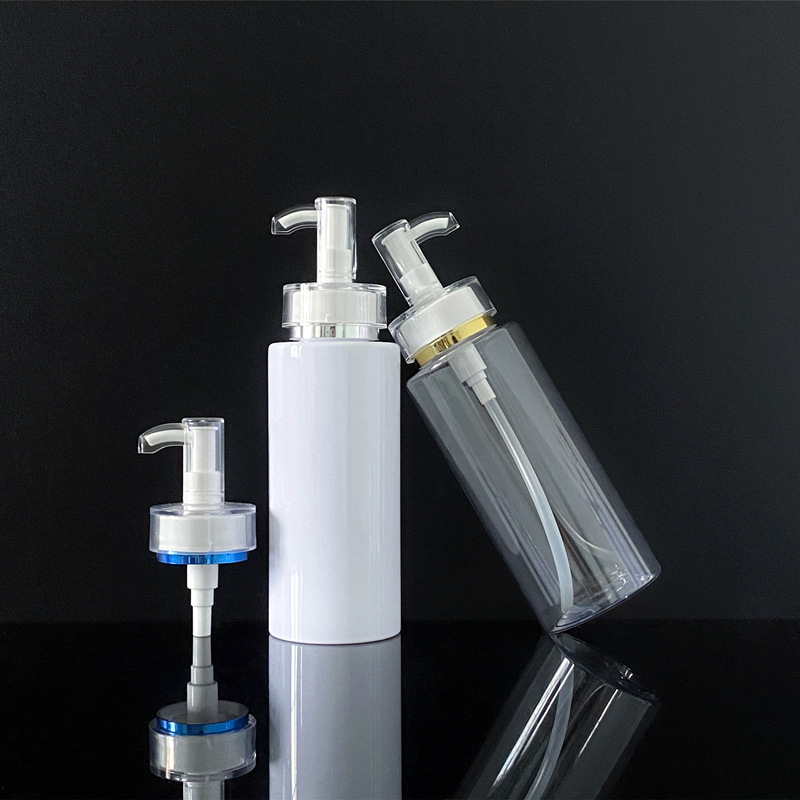 Transparent white flat - shouldered cosmetic lotion and toner dispensing bottles with press pumps Transparent white flat - shouldered cosmetic lotion and toner dispensing bottles with press pumps