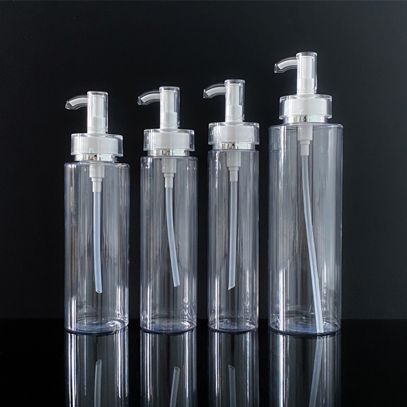Transparent white flat - shouldered cosmetic lotion and toner dispensing bottles with press pumps Transparent white flat - shouldered cosmetic lotion and toner dispensing bottles with press pumps