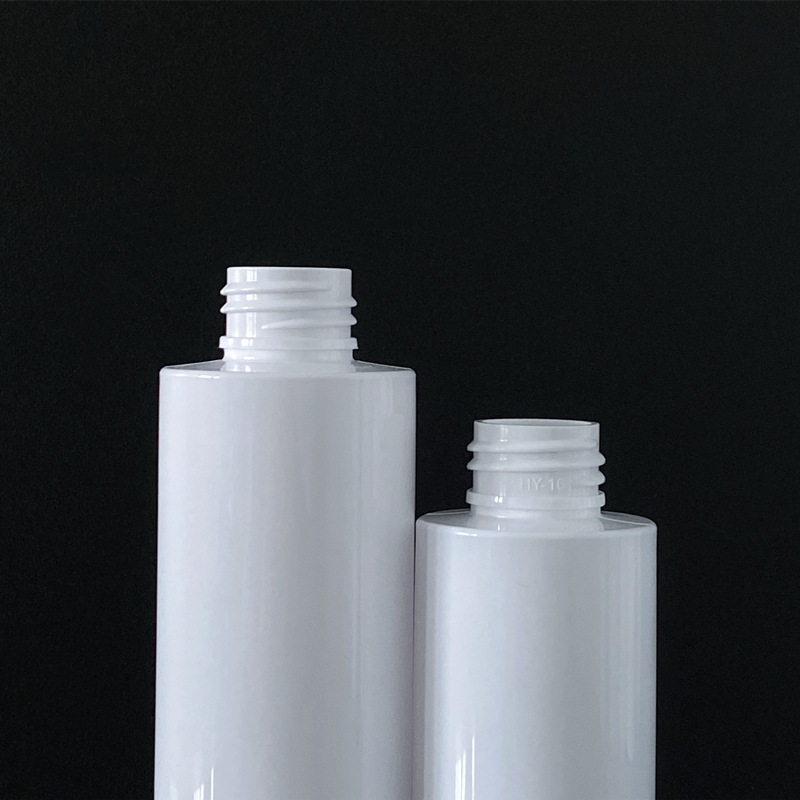 Transparent white flat - shouldered cosmetic lotion and toner dispensing bottles with press pumps Transparent white flat - shouldered cosmetic lotion and toner dispensing bottles with press pumps