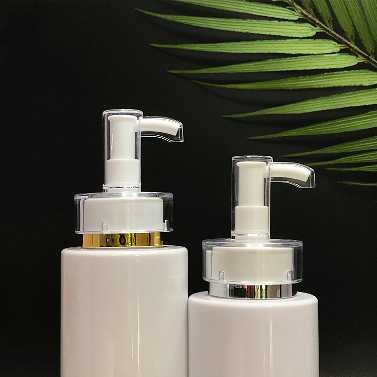 Transparent white flat - shouldered cosmetic lotion and toner dispensing bottles with press pumps